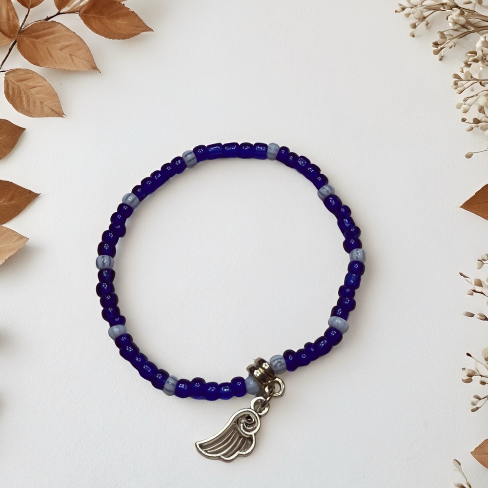 Cobalt Blue Beaded Bracelet with Pink Wing Charm - Picture 2 of 6